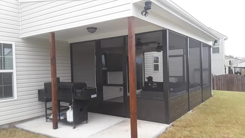Aluminum screened porch installation in Five Forks SC with covered patio and outdoor living space by Burch Contracting Aluminum screened porch installation in Five Forks SC with covered patio and outdoor living space by Burch Contracting